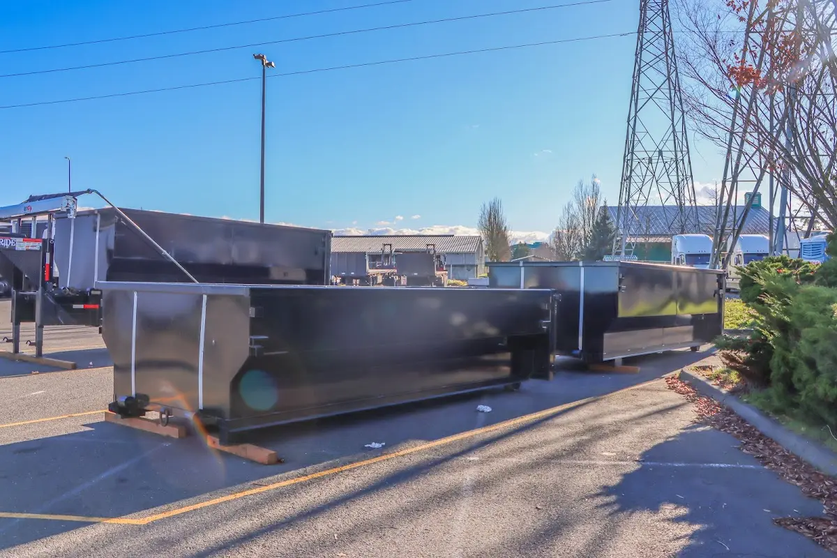 Roll-off dumpster ready for waste disposal at job site for Yard Waste Dumpster Rental in Wayne